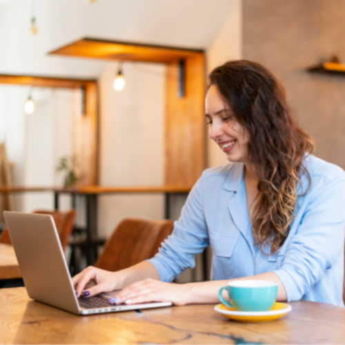 medium-shot-woman-typing-laptop